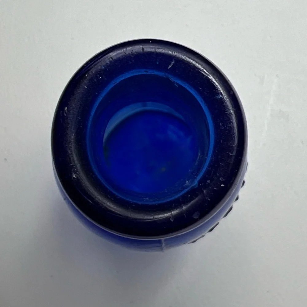 Lot of 4 vintage Colbalt Blue Glass Bottles